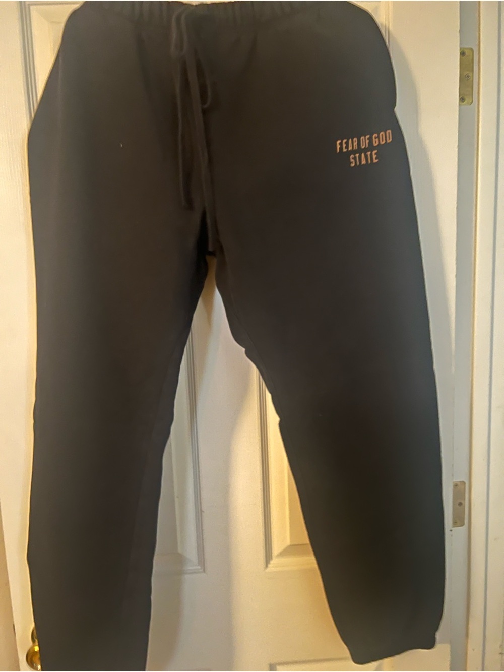Essentials Men's Black Sweatpants with Subtle Logo